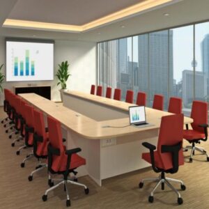 Spacious U-shaped conference table with wood finish, designed for large meetings and collaborative discussions.