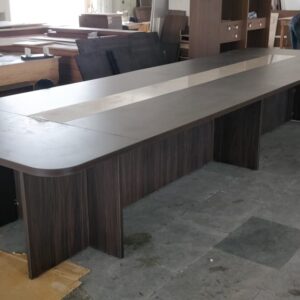 Elegant espresso-colored conference table with a sleek finish, perfect for modern office meeting rooms.